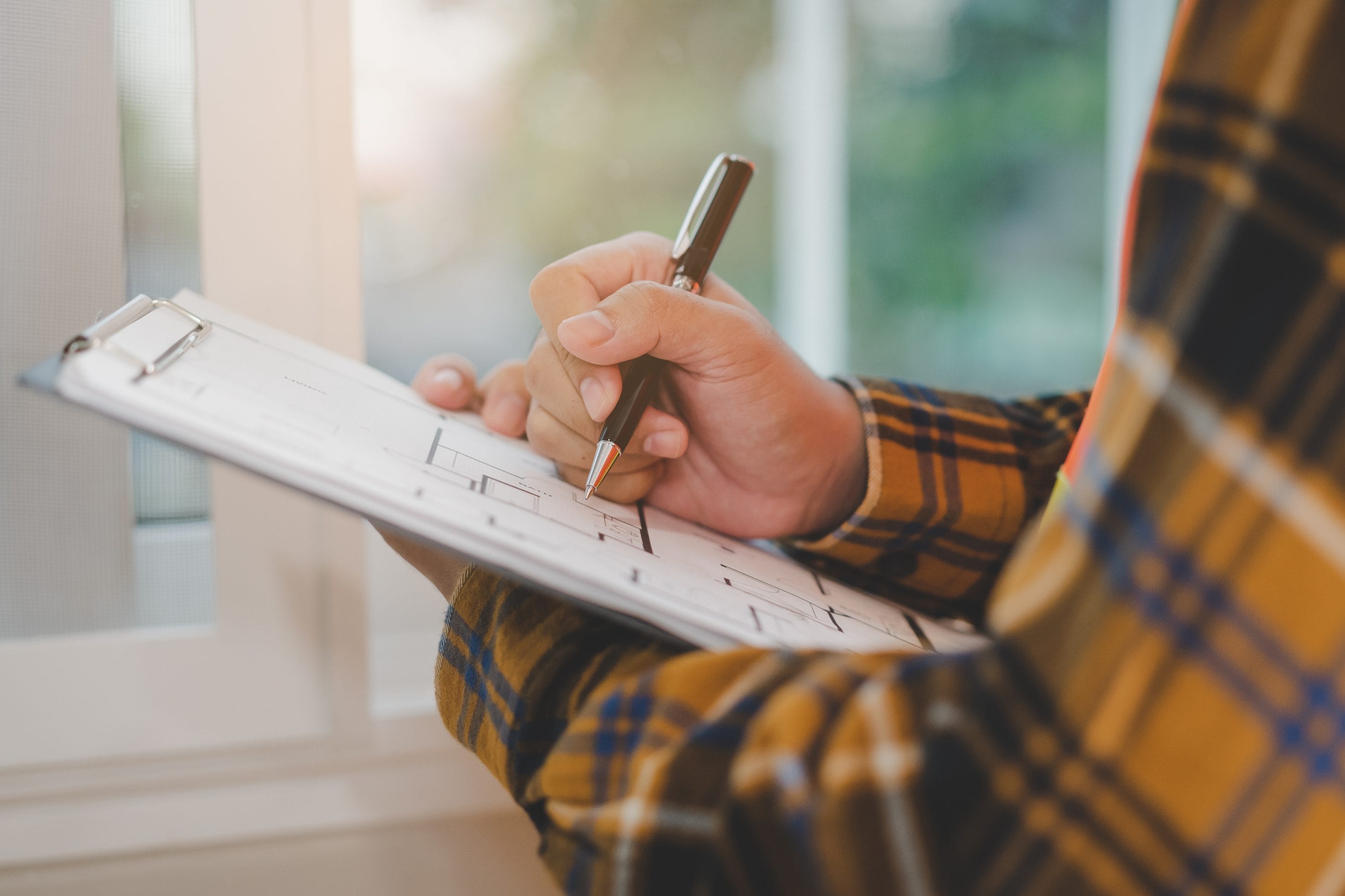 Home Inspector Conducting Pre-Listing Inspection
